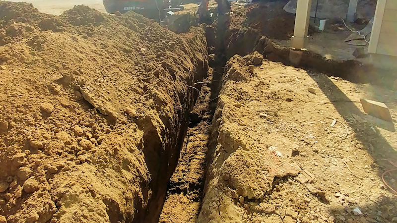 Completed trenching for electrical lines