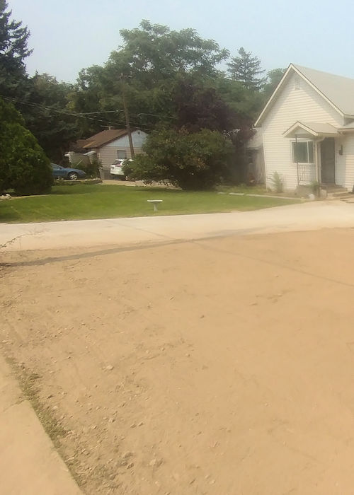 Finished concrete driveway and final grading
