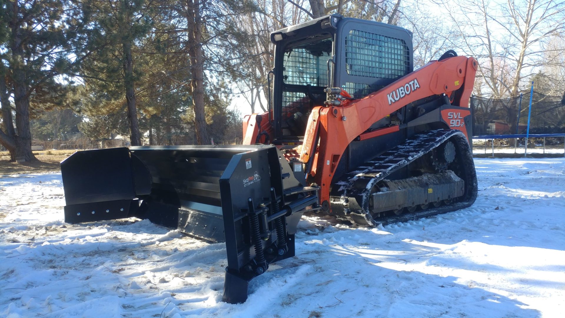 Skidsteer with Snow Pusher